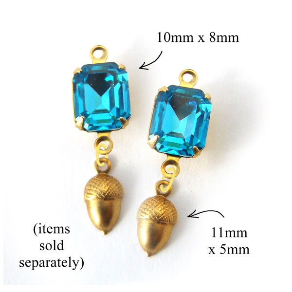 earrings design idea featuring raw brass acorn charms and faceted small octagon glass gems