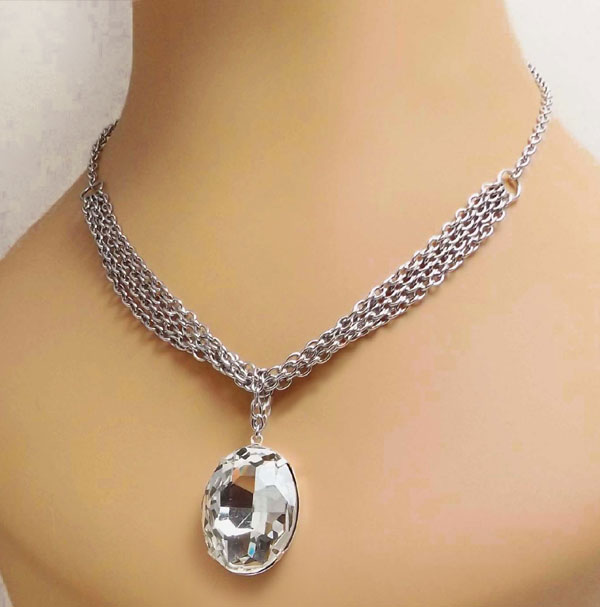 crystal oval rhinestone necklace with multiple strands of stainless steel chain
