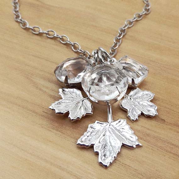 necklace with silver leaf and clear glass jewels